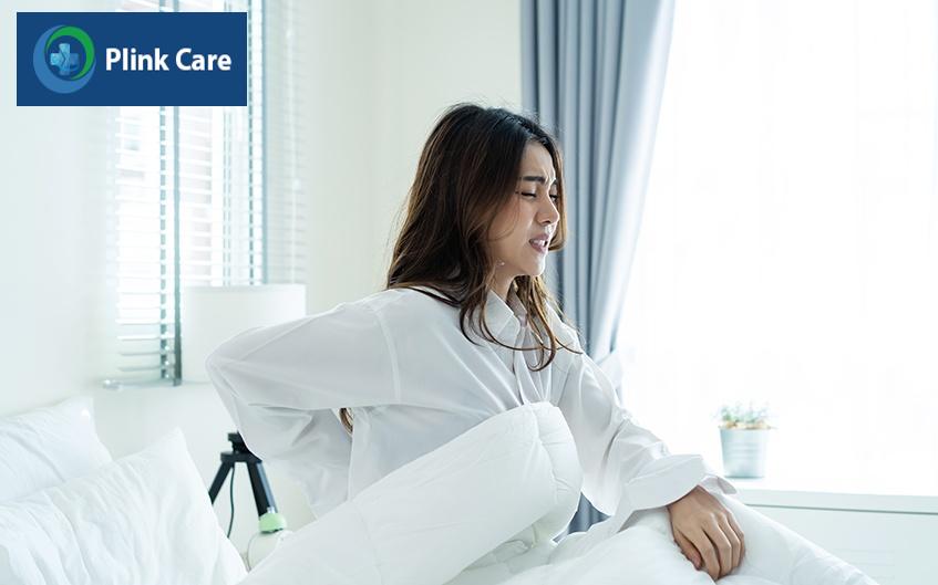 khi thức dậy cảm thấy đau ở lưng