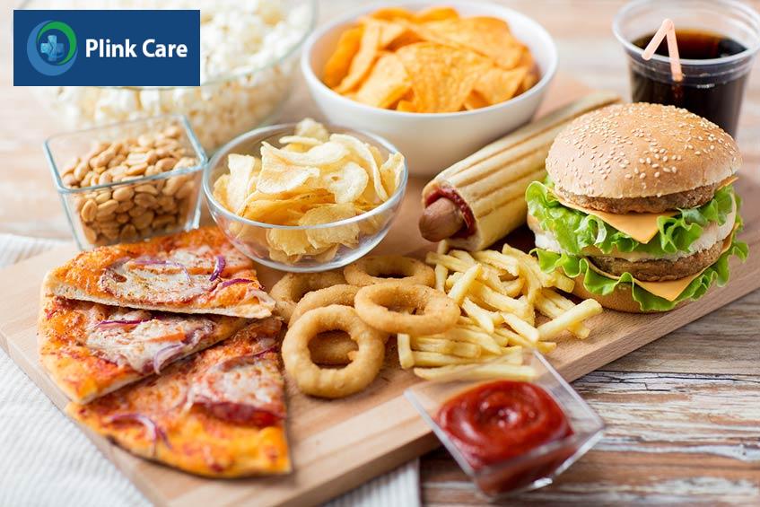 hạn chế đồ ăn cay nóng nhiều dầu mỡ
