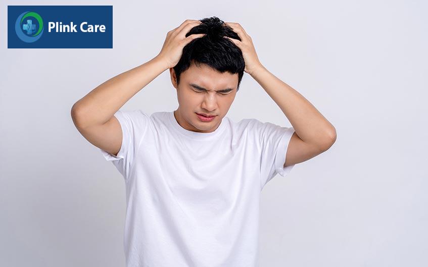 đau đầu là tác dụng phụ có thể gặp khi uống Panadol do phản ứng với các thành phần trong thuốc