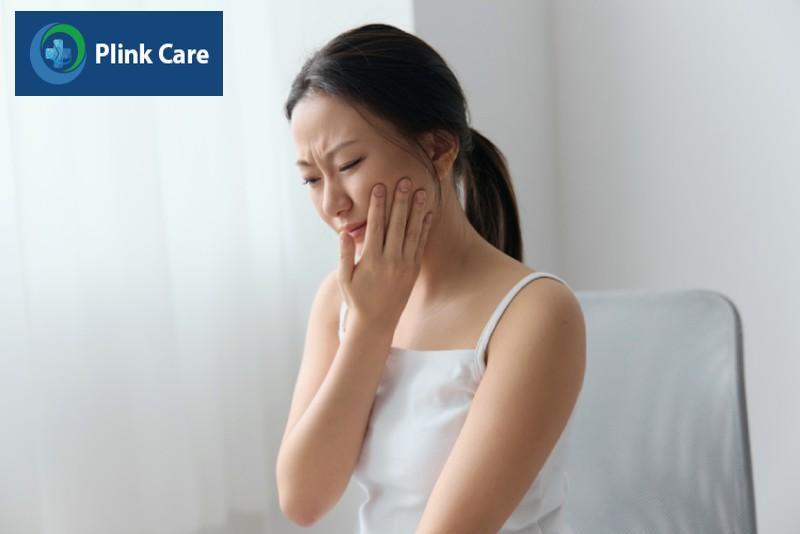 dấu hiệu nhiễm trùng sau khi nhổ răng khôn