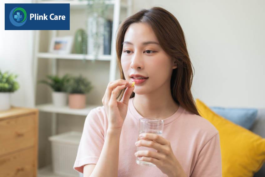 Nên uống nguyên viên thuốc với 1 ly nước đầy